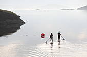Stand-up paddle boarding in Tarbert Bay, Isle of Harris, Outer Hebrides