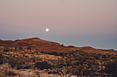 Full moon rising over the Pilbara in Western Australia, Australia, Oceania;