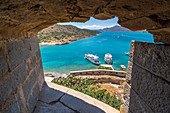View through cannon opening from south bastion to sea, Spinalonga, Plaka, northeastern Crete, Greece