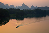 Boat on River Li and Limestone Karst Formations\nGuilin Region\nGuangxi, China\nLA008308\n