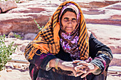 Bedouin sits in the hills of Petra, Jordan