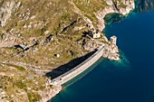 France, Hautes Pyrenees, Louron valley, Lake of Caillauas (2160 m), dam (aerial view)