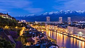 France, Isere, Grenoble, view of the quays of Isere and snowy Belledonne range