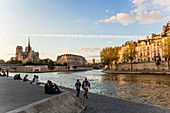 France, Paris, area listed as World Heritage by UNESCO, Quai de la Tournelle with Notre Dame de Paris cathedral