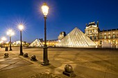 France, Paris, area listed as World Heritage by UNESCO, the Louvre Pyramid of the architect Ieoh Ming Pei, facade of the pavillon of Richelieu in the court Napoleon