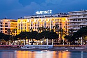 France, Alpes-Maritimes, Cannes, the palace Martinez on the boulevard de la Croisette by night
