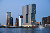 View of the skyline at the cruise terminal in Rotterdam, Netherlands during the blue hour over the New Maas.
