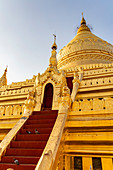 Stairs to the golden Shwezigon Pagoda, Bagan, Myanmar