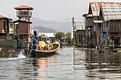 Boat trip through floating village on Inle Lake, Heho, Myanmar