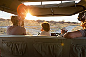 family in safari vehicle, Kalahari Desert, Makgadikgadi Salt Pans, Botswana