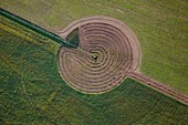 France, Alpes de Haute Provence, Greoux les Bains, irrigation of a field in the shape of a circle (aerial view)