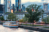 The skyline of Frankfurt from iron bridge of Main River, Germany, Europe