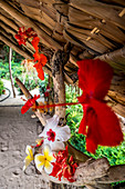 Colorful tropical flowers in a hut, Efate, Vanuatu, South Pacific, Oceania