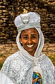 A bride having wedding photos taken at Emperor Fasilides Castle, known as the Royal Enclosure (or Fasil Ghebbi) is the remains of a fortress-city in Gondar, Ethiopia.