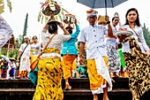 Balinese Hindu People At The Batara Turun Kabeh Ceremony, Besakih Temple, Bali, Indonesia.