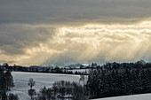 Sunset through a thick cloud cover in Pfarrkirchen near Bad Hall.