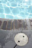 Pool edge and pool in Los Angeles, California, USA.