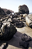 Wet rocks on Big Sur Beach, California, USA.