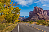 Utah SR 211 winding through the canyons of Indian Creek, along the Indian Creek Corridor Scenic Byway, in Indian Creek National Monument, formerly part of Bears Ears National Monument, on the way to the Needles District of Canyonlands National Park in southern Utah, USA