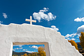 Detail of the entrance gate to the Roman Catholic Church at the Taos Pueblo which is the only living Native American community designated both a World Heritage Site by UNESCO and a National Historic Landmark in Taos, New Mexico, USA.