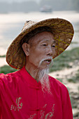 Cormorant Fisherman Portrait\nGuilin Region\nGuangxi, China\nLA008339