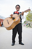 Mariachi player with guitar