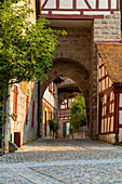 Entrance to the courtyard of Cadolzburg Castle in the late afternoon, Cadolzburg, Franconia, Bavaria, Germany