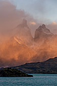 Chile,Patagonia,Magallanes and Chilean Antarctica Region,Ultima Esperanza Province,Torres del Paine National Park,sunrise over Paine Horns and Lake Pehoé 