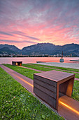 sunrise on the lakeside in front of Lecco,Malgrate, lecco province, lombardy, north italy, italy
