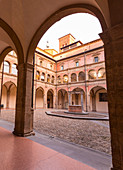 The interior of San Giovanni in Monte courtyard, Renaissence architecture of ancient convent of city. Bologna, Emilia Romagna, Italy, Europe.