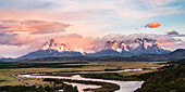 Paine Horns, Cerro Paine and Cerro Paine Grande at dawn, with Serrano river in the foreground. Torres del Paine National Park, Ultima Esperanza province, Magallanes region, Chile.