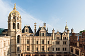 On the roofs of the Schwerin Castle surrounded by towers, domes, chimneys, Mecklenburg-Western Pomerania, Germany
