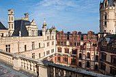 On the roofs of the Schwerin Castle surrounded by towers, domes, chimneys, Mecklenburg-Western Pomerania, Germany