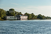 Large tourist boats in the Danube Delta near Sulina, Tulcea, Romania.
