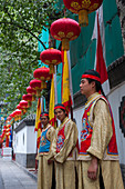 The restaurant staff of the Bai Jia Da Yuan Restaurant in Beijing, China dressed in historic costumes.