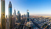 Elevated view over the modern Skyscrapers along Sheikh Zayed Road looking towards the Burj Kalifa, Dubai, United Arab Emirates