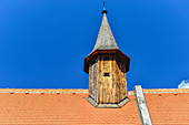 View of an old roof with a wooden tower in Rossatz an der Donau, Austria