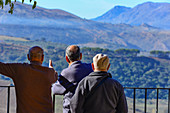 Three old men look at the mountains, Ronda, Andalusia, Spain