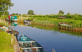 A view of the boating dyke by the Staithe on the Norfolk Broads at West Somerton, Norfolk, England, United Kingdom.