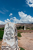 A marker and a sundial mark the latitude of the Tropic of Capricorn in the valley of Quebrada de Humahuaca, Andes Mountains, Jujuy Province, Argentina.