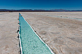 Salt mining at Salinas Grandes a salt pan in the Andes Mountains - is situated on an altitude of 3.450 meters on the border of the provinces of Salta and Jujuy, Argentina.