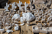 Souvenirs stand with salt carvings at the salt flat Salinas Grandes in the Andes Mountains, Jujuy Province, Argentina.