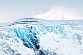 Blue glacier front in Van Mijienfjord, Spitsbergen, Svalbard\n
