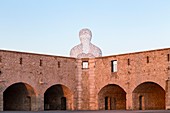 France, Alpes-Maritimes, Antibes, terrace of the bastion Saint-Jaume in the port Vauban, the transparent sculpture the "Nomad", created by the Spanish sculptor Jaume Plensa, the bust formed by letters
