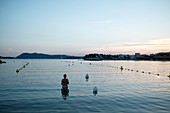 France, Var, morning swimmer in the harbor of Toulon, on the beaches of Mourillon