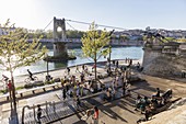 France, Rhone, Lyon, historical site listed as World Heritage by UNESCO, the footbridge of the College over the Rhone, quay general Sarrail with a view of the Croix Rousse