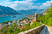 View of cruise ship and Chapel of Our Lady of Salvation overlooking the Old Town, UNESCO World Heritage Site, Kotor, Montenegro, Europe