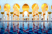 Abu Dhabi's magnificent Grand Mosque lit up during the evening blue hour, Abu Dhabi, United Arab Emirates, Middle East