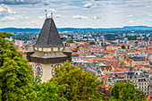 View of Clock Tower and cityscape, Graz, Styria, Austria, Europe