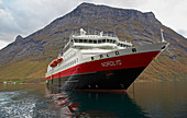 Hurtigruten in the Hjoerundfjorden near Urke, Nahe Alesund, Moere og Romsdal, Norway, Europe